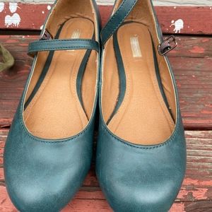 Dark green flats